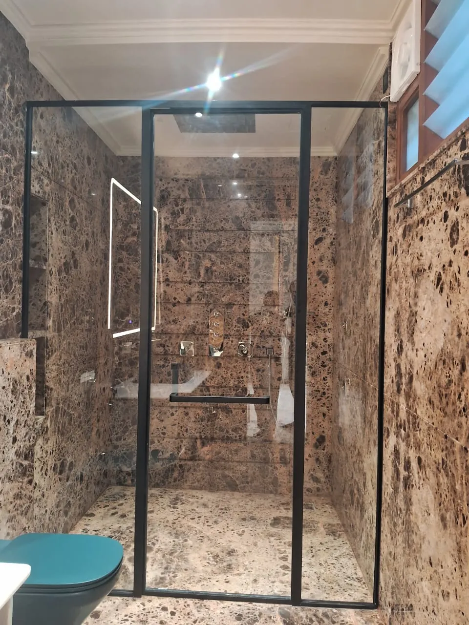 Matte black, central door, brown marble